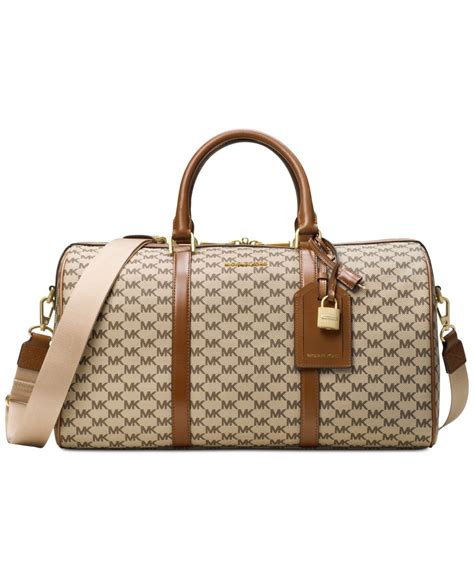 michael kors connie duffle bag|Michael Kors trolley suitcase.